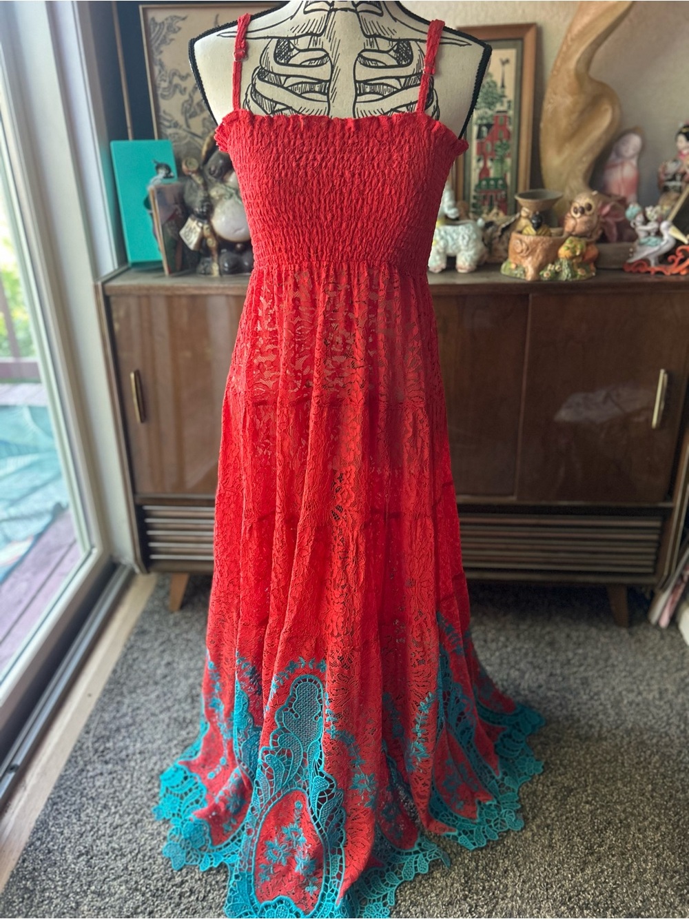 Turquoise and coral/red dress by Antica Sartoria
